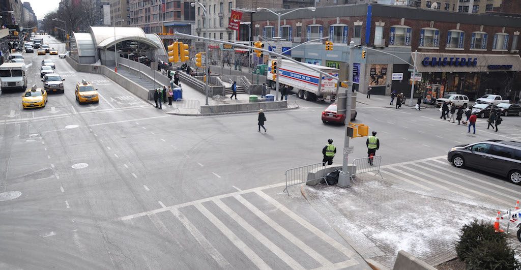 The intersection of 96th Street and Broadway after the opening of the subway entrance in the median in 2010; crossing favored turning cars, giving pedestrians long waits at the corner. | Image via NYC DOT