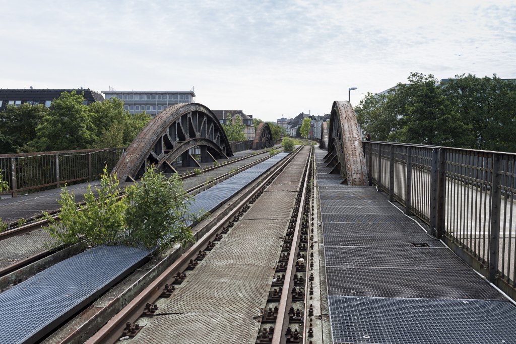 An old train bridge through Essen. The Ruhr region was an industrial heartland and contains many disused train-lines that will be repurposed for the Radschnellweg bike superhighway. | Photo by Peter Obenhaus, AFGS.