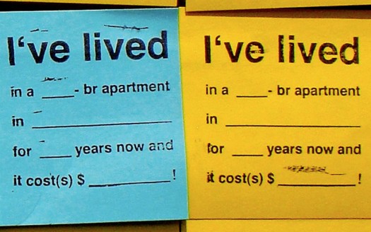 Each note was stamped with the same fill-in-the-blank sentence: "I've Lived in _____ for ___ years and it cost(s) _____!"