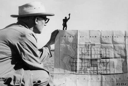 Le Corbusier inspects his 1950 plan for Chandigarh