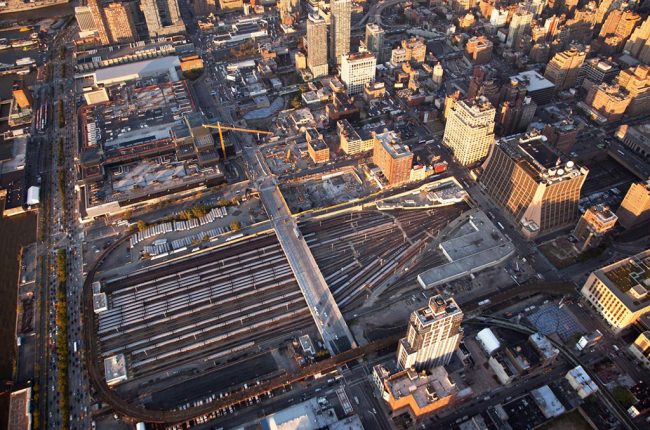 Aerial view of Hudson Yards in 2010. A platform over the rail yards is currently being constructed. | Photo via Hudson Yards